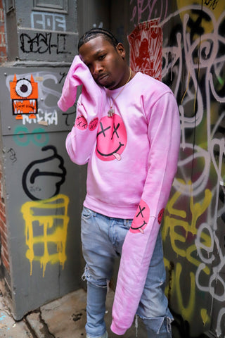 The Pink “Drunken Smiley” Sweater 🔥